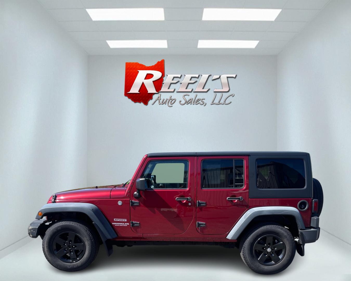 2012 Red /Black Jeep Wrangler Unlimited Sport 4WD (1C4BJWDG3CL) with an 3.6L V6 DOHC 24V engine, 5-Speed Automatic transmission, located at 547 E. Main St., Orwell, OH, 44076, (440) 437-5893, 41.535435, -80.847855 - This 2012 Jeep Wrangler Unlimited Sport with 4WD features a robust 3.6-liter Pentastar V6 engine paired with a 5-speed automatic transmission. It is equipped with a Dana 44 rear axle and a Dana 30 front axle, ensuring durable and reliable off-road capabilities. The model comes with a hardtop convert - Photo#9